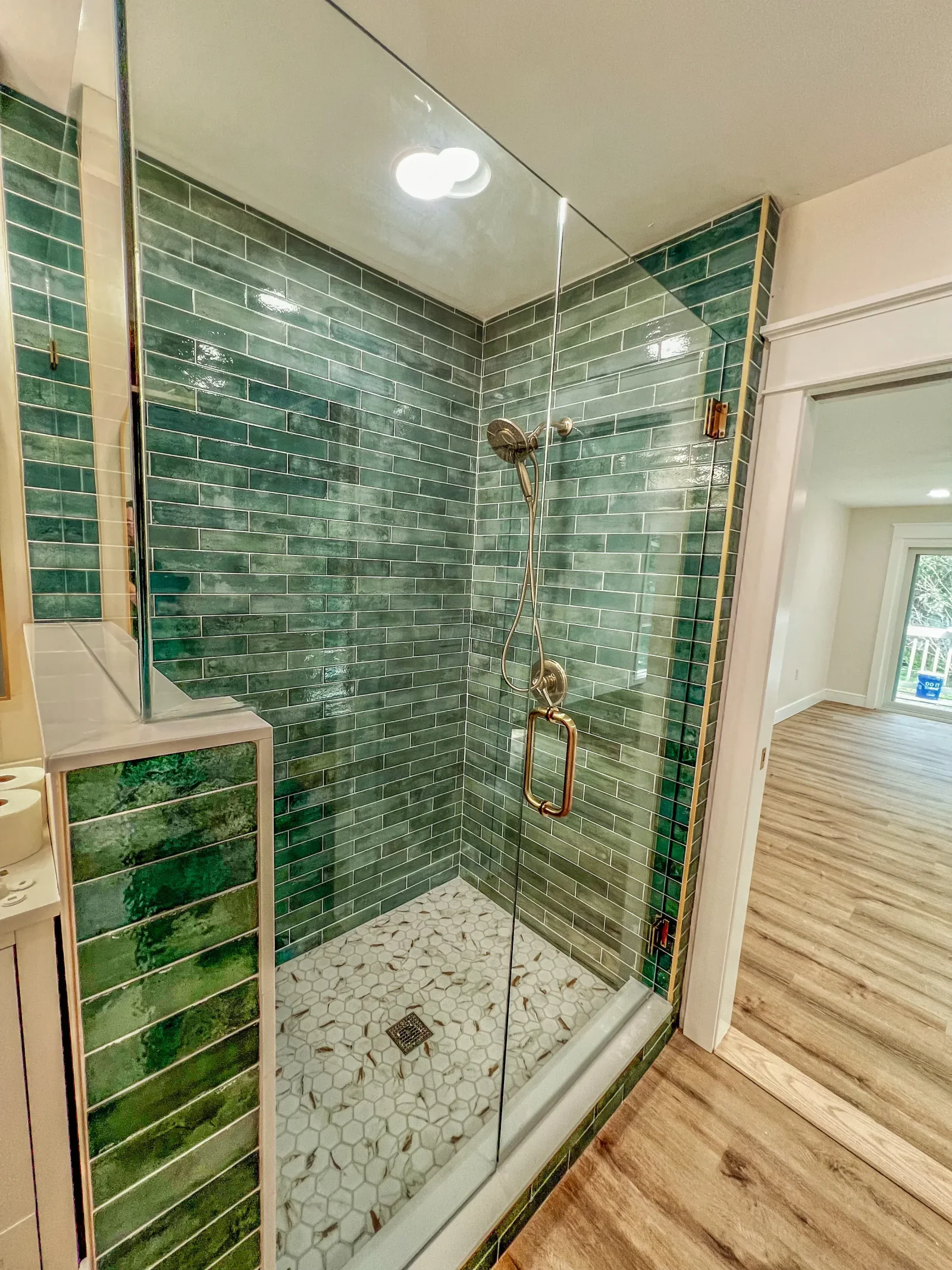 Renovated bathroom with modern fixtures and tile